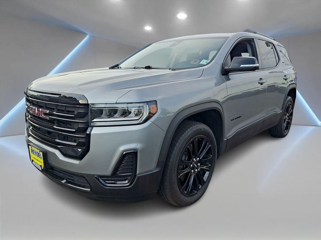 2023 GMC Acadia SLE in Sterling Metallic — front three-quarter view