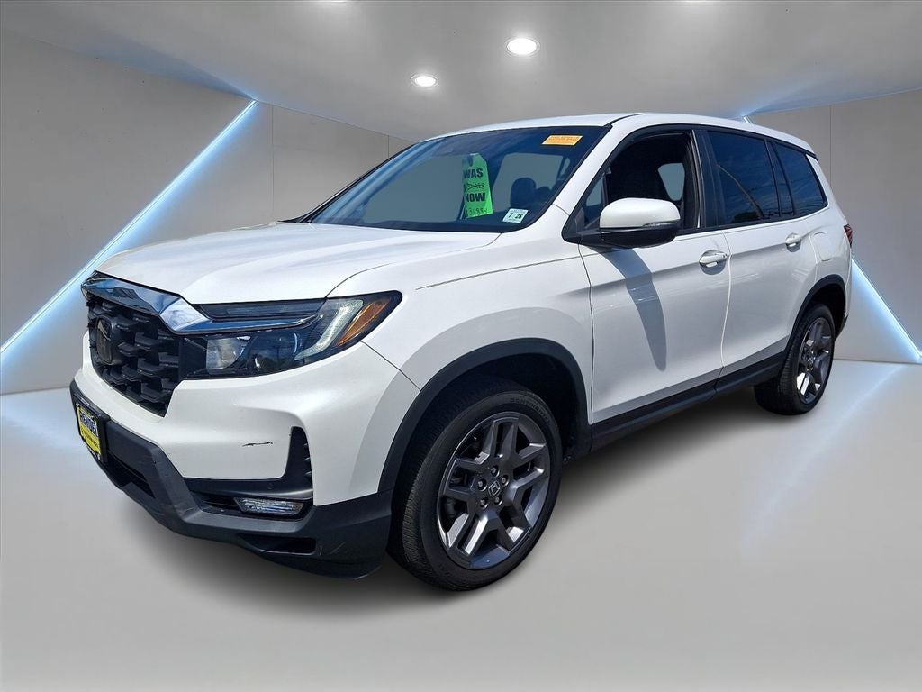 2023 Honda Passport EX-L in Platinum White Pearl — front three-quarter view