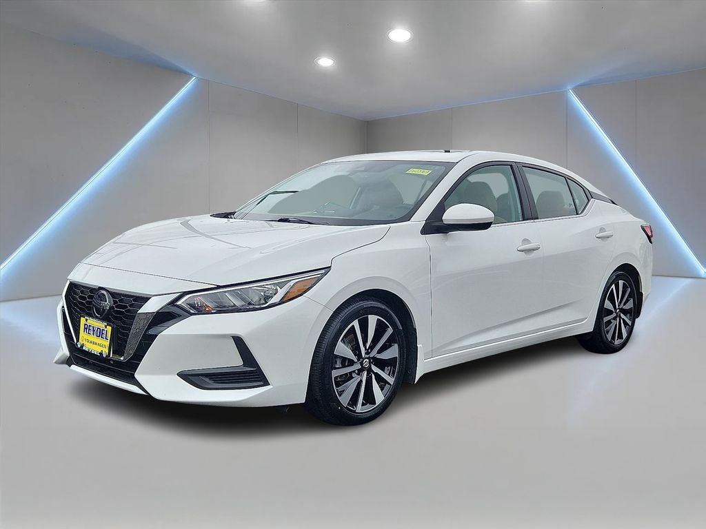 2023 Nissan Sentra SV in Aspen White Tricoat — front three-quarter view